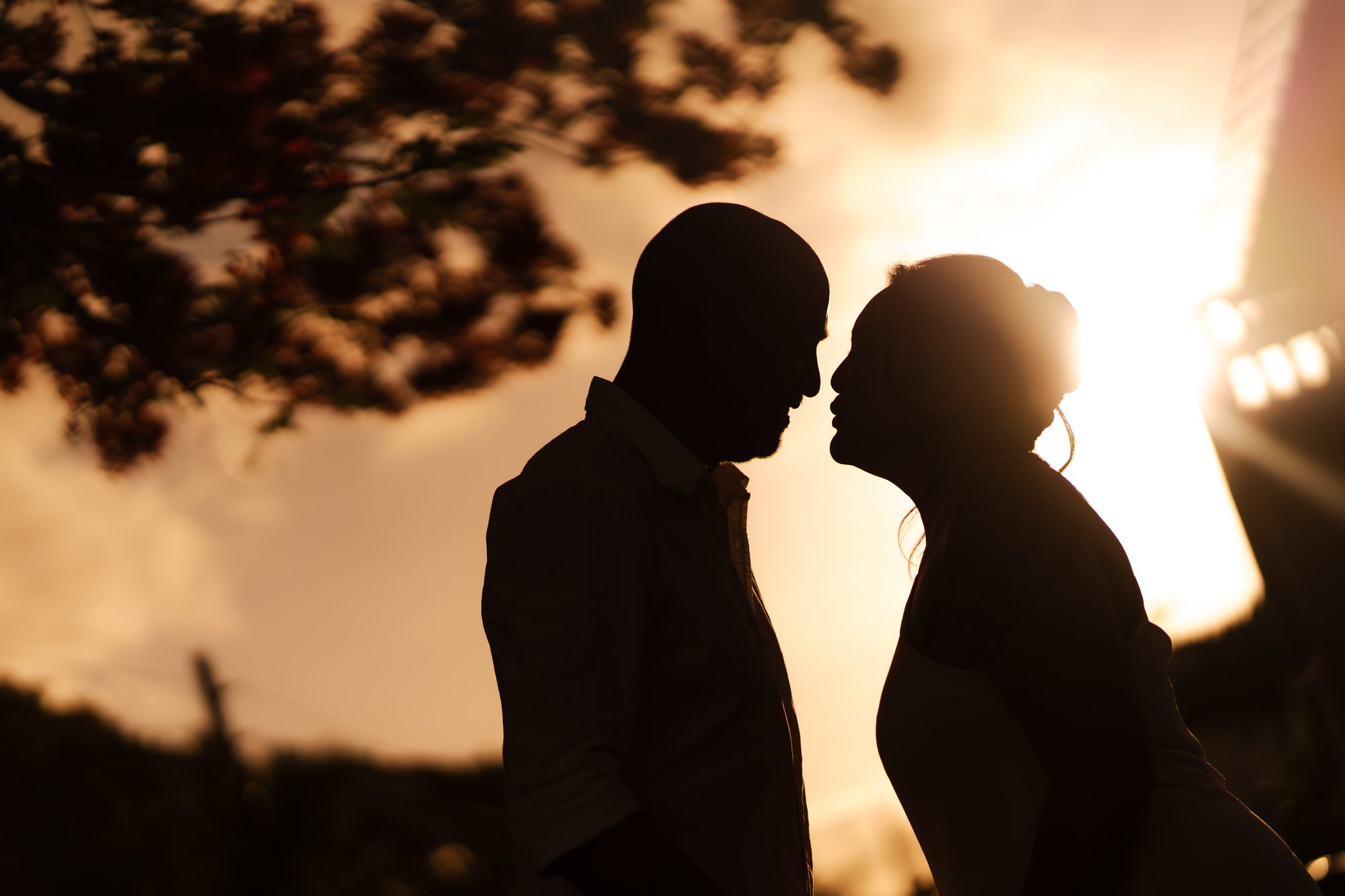 Couple embracing at sunset