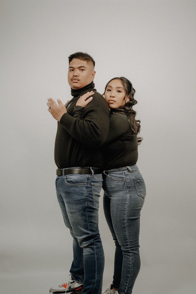 Contemporary couple portrait with coordinated styling