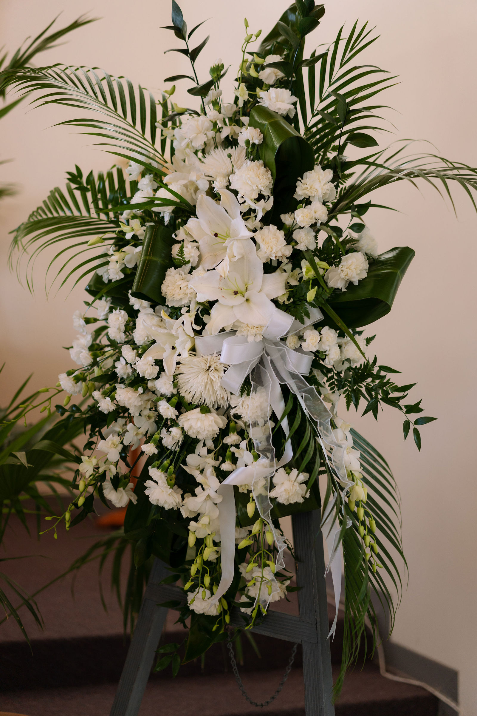 Floral tribute at a Guam memorial service photographed by Stel Star